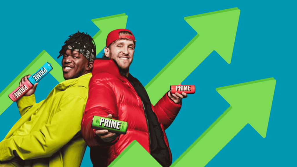 Logan Paul and KSI holding Prime drinks with large green upward arrows in the background, symbolising rapid brand growth