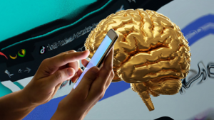 Hands holding a smartphone in front of a floating golden brain with social media icons in the background.